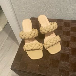 Slip on braided heels lightly worn; size 8. Neutral color